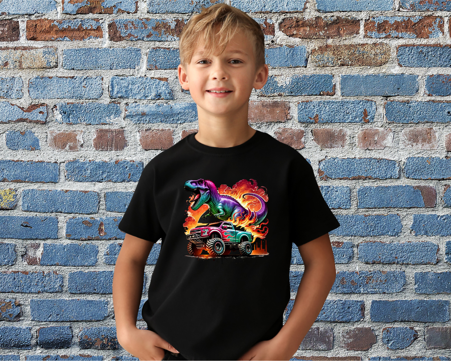 Child wearing a black t-shirt with a colorful graphic design in front of a brick wall.
