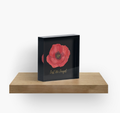 small size acrylic block decor with red poppy print and text Lest We Forget