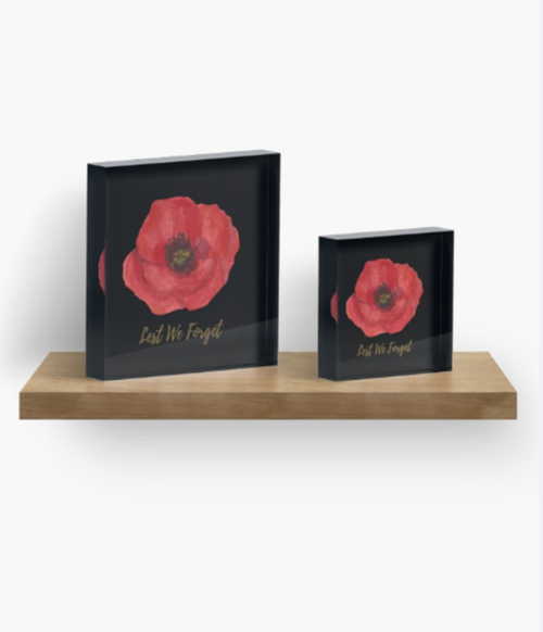 two sizes acrylic block decor with red poppy print and text Lest We Forget