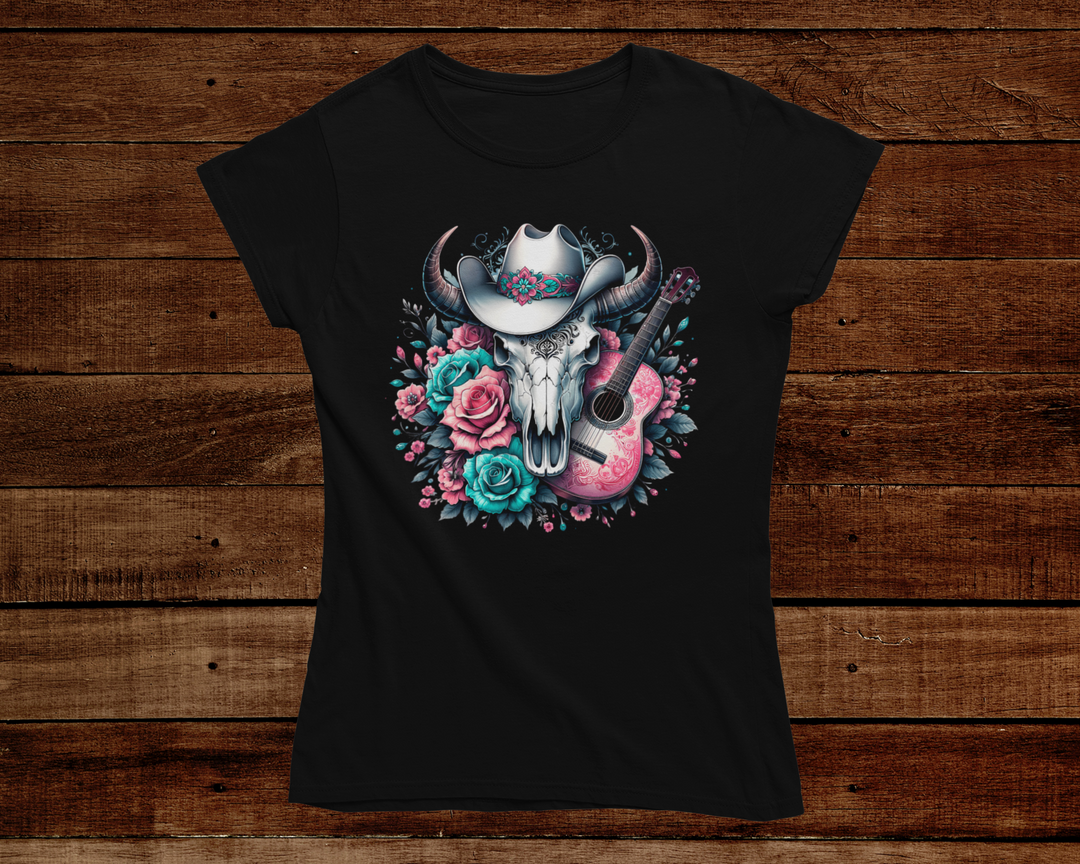 Black t-shirt with a skull and roses design on a wooden background