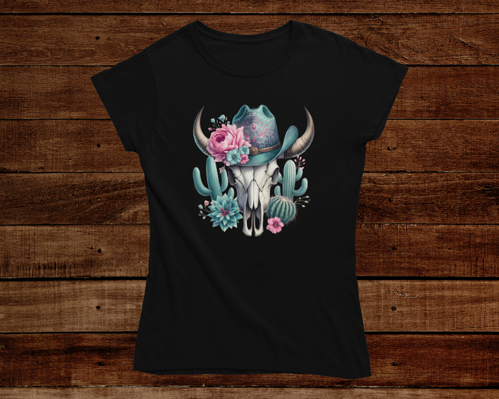 Black t-shirt with a skull and hat design on a wooden background