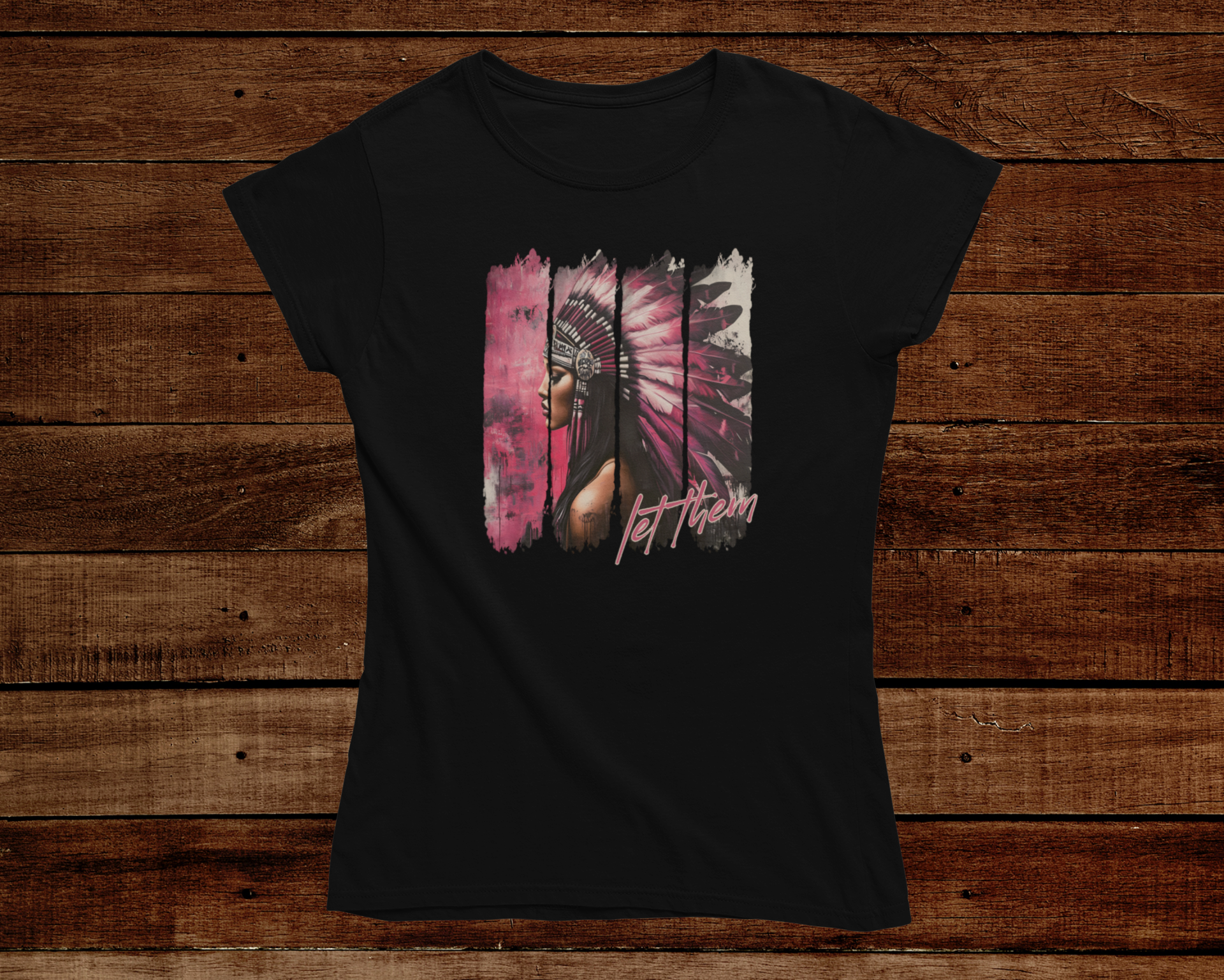 Black t-shirt with a colorful graphic design on a wooden background